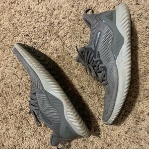 Grey adidas alpha bounce sneakers